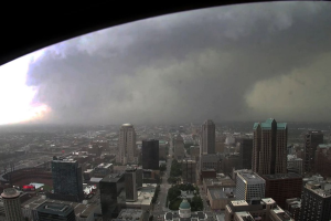 tornado in background of St. Louis city from Arch camera.