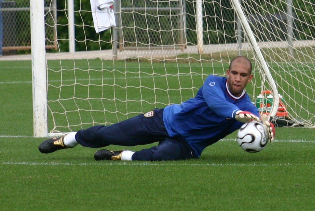 Tim Howard dives to make a save.