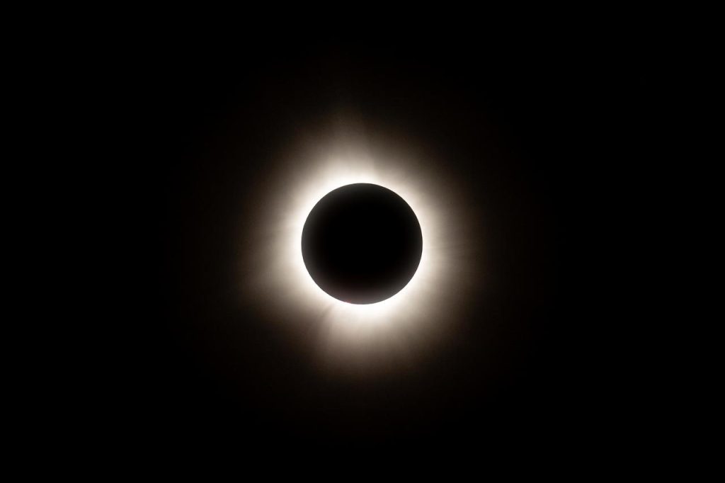 A total solar eclipse is seen from NASA's Glenn Research Center, Monday, April 8, 2024, in Cleveland, Ohio. A total solar eclipse swept across a narrow portion of the North American continent from Mexico’s Pacific coast to the Atlantic coast of Newfoundland, Canada. A partial solar eclipse was visible across the entire North American continent along with parts of Central America and Europe. Photo Credit: (NASA/Jordan Salkin)